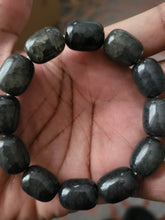 Black Labradorite polished stone stretch bracelet with smooth, chunky beads.