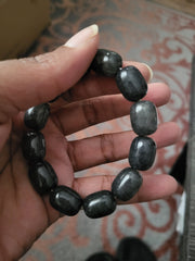 Black Labradorite polished stone stretch bracelet with smooth, chunky beads.